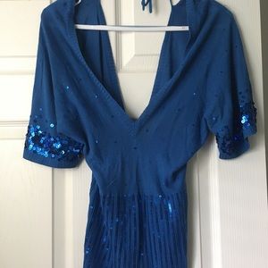 Gorgeous Guess XS sequin blouse with open back.